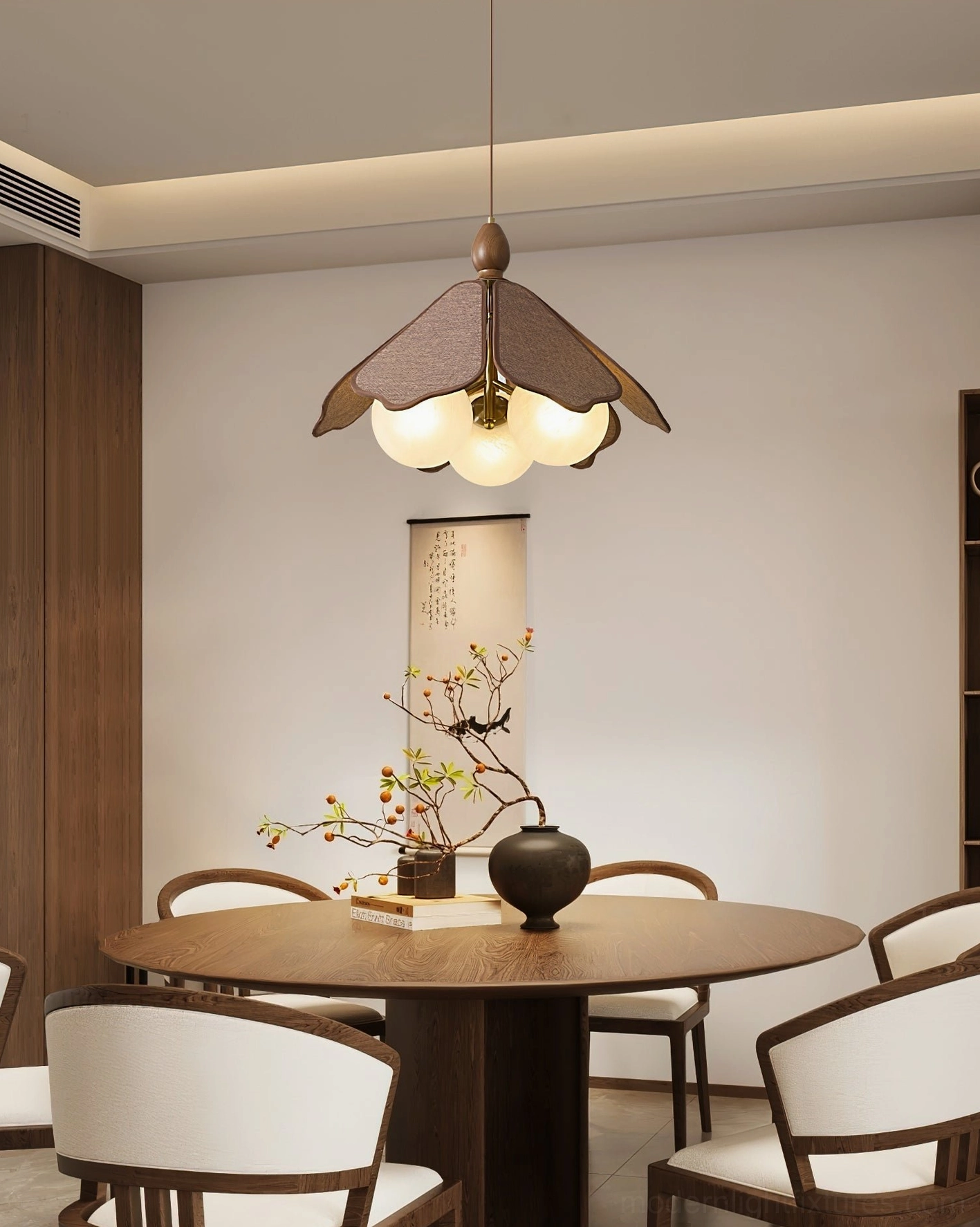 Feyora organic petal pendant lamp in formal dining space with upholstered chairs and floral decor