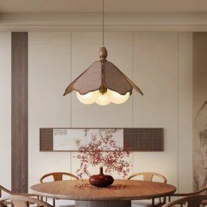 Feyora wooden petal pendant lamp hanging in warm minimalist dining room with Japanese zen aesthetic