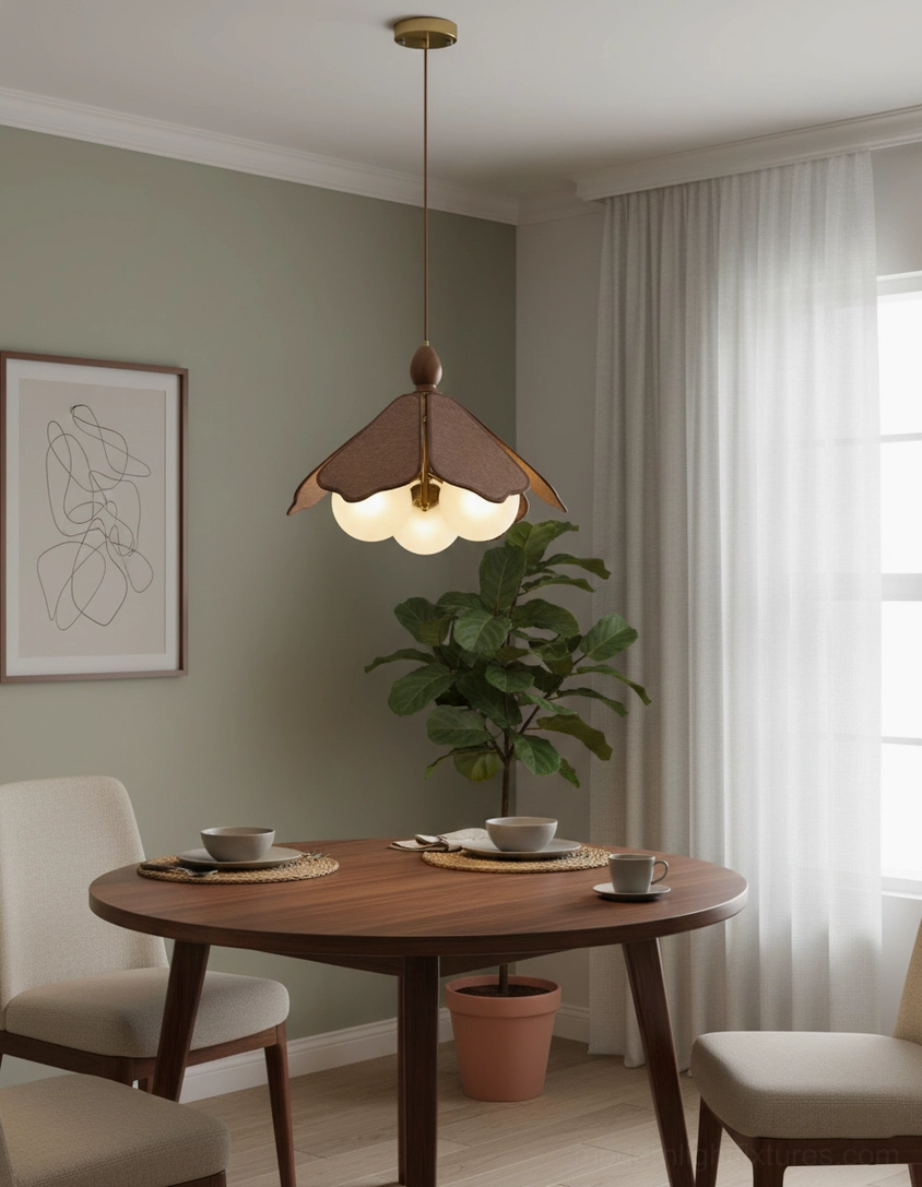 Feyora organic glass pendant lamp in green-walled dining area with potted floor plant modern home
