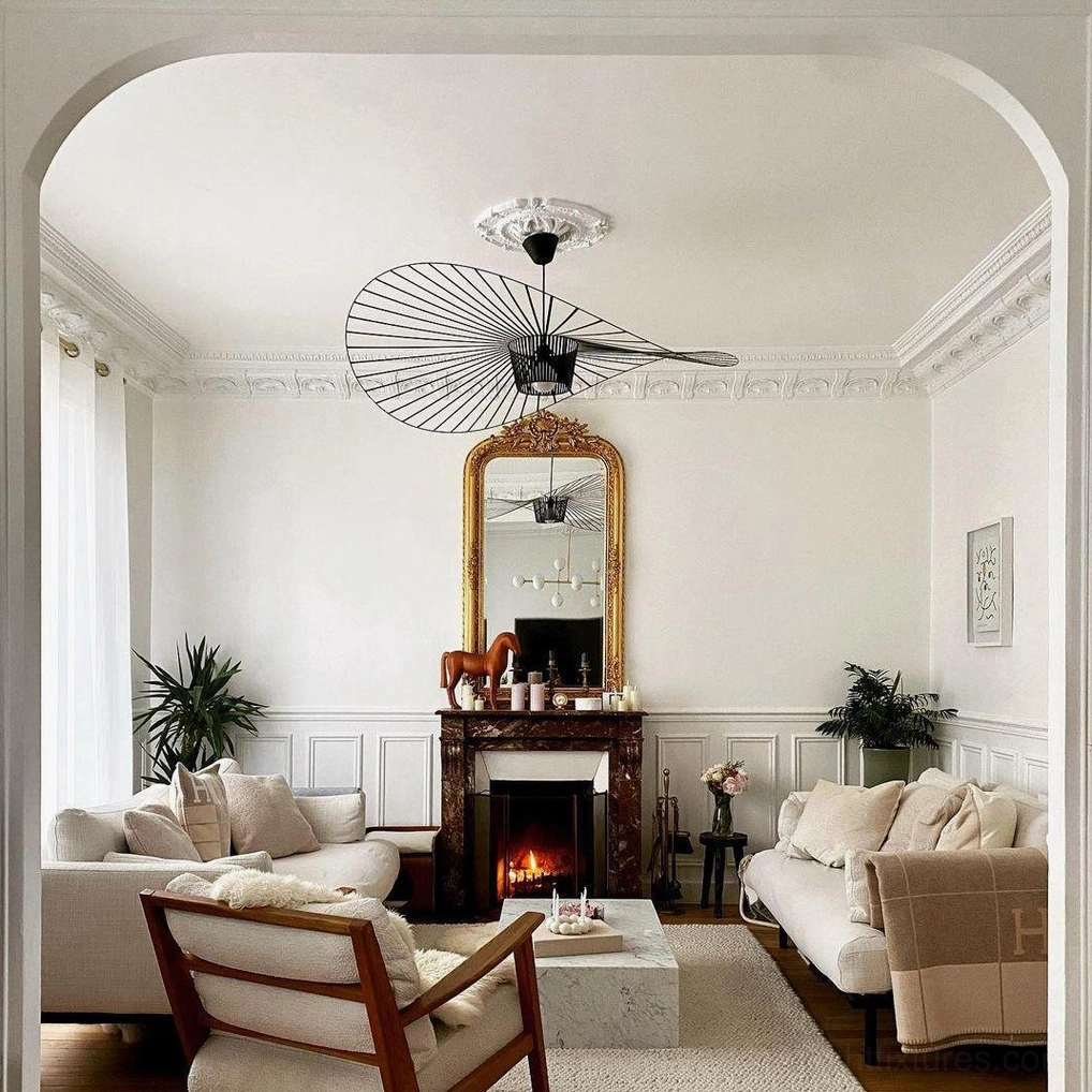 Woven fiber glass pendant lamp creating gallery-like installation presence in residence