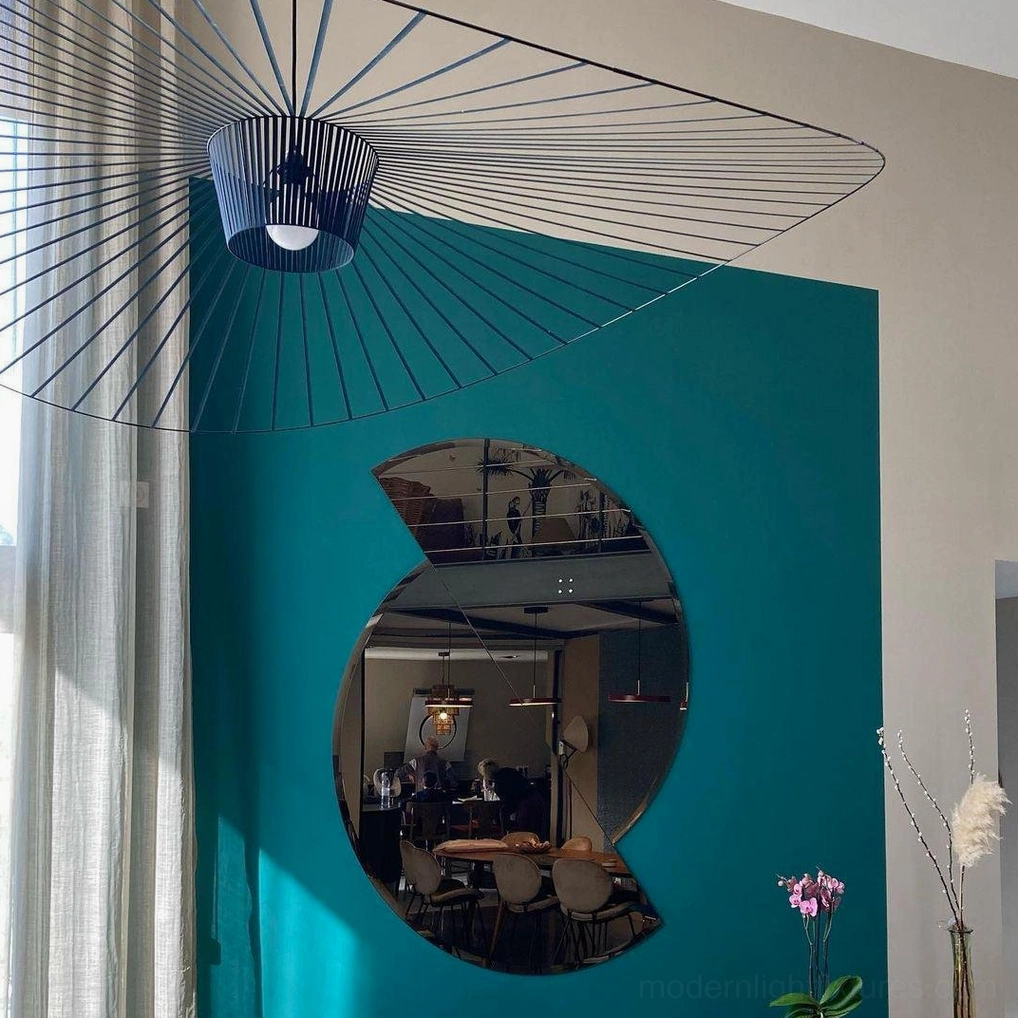 Woven fiber glass pendant with natural material pairing rattan linen wood