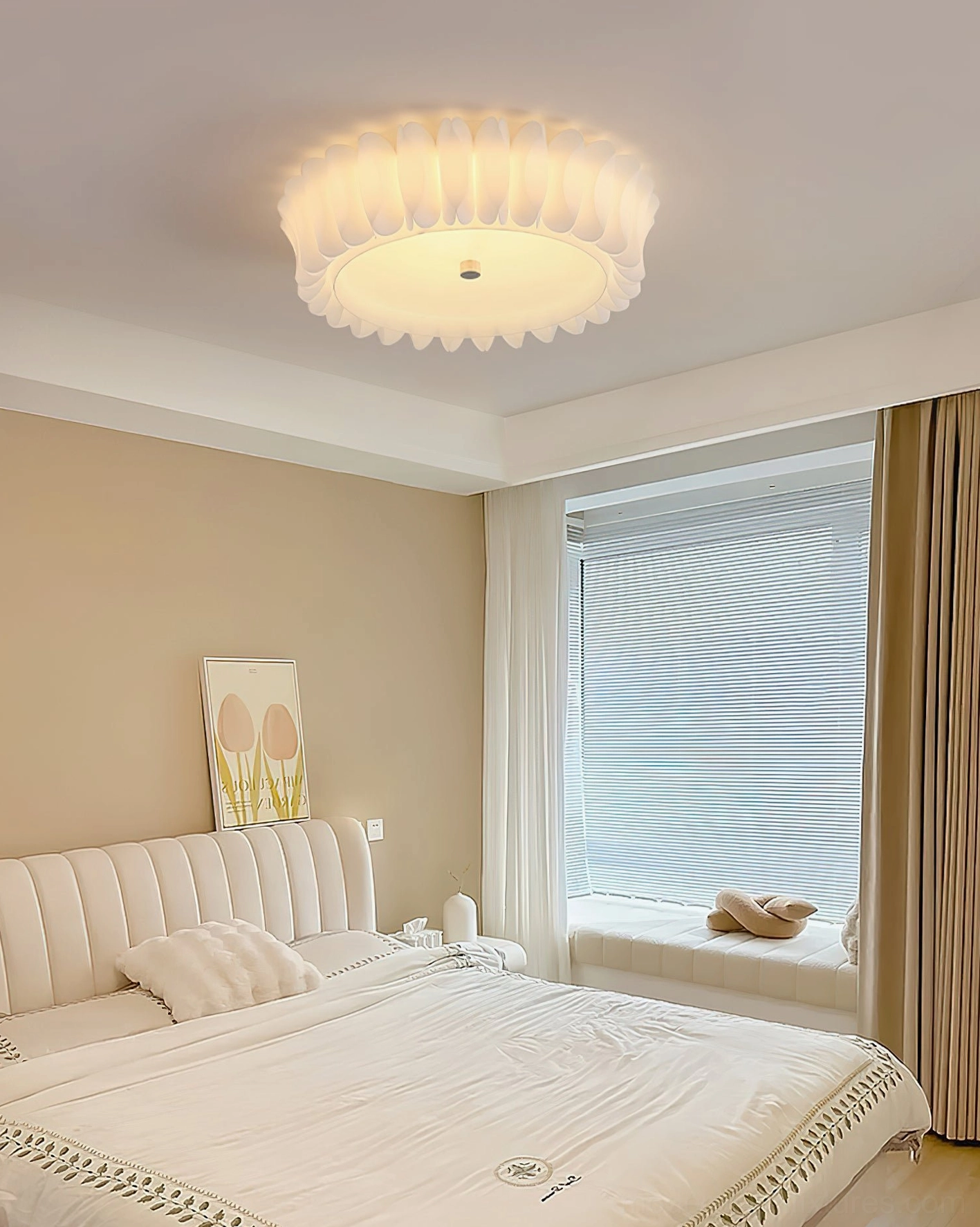 Modern king-size bedroom featuring Figura ruffled off-white ceiling fixture with warm neutral minimalist decor