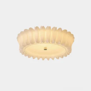 Figura ruffled flush mount ceiling light with cream petal-shaped trim, front close-up studio shot