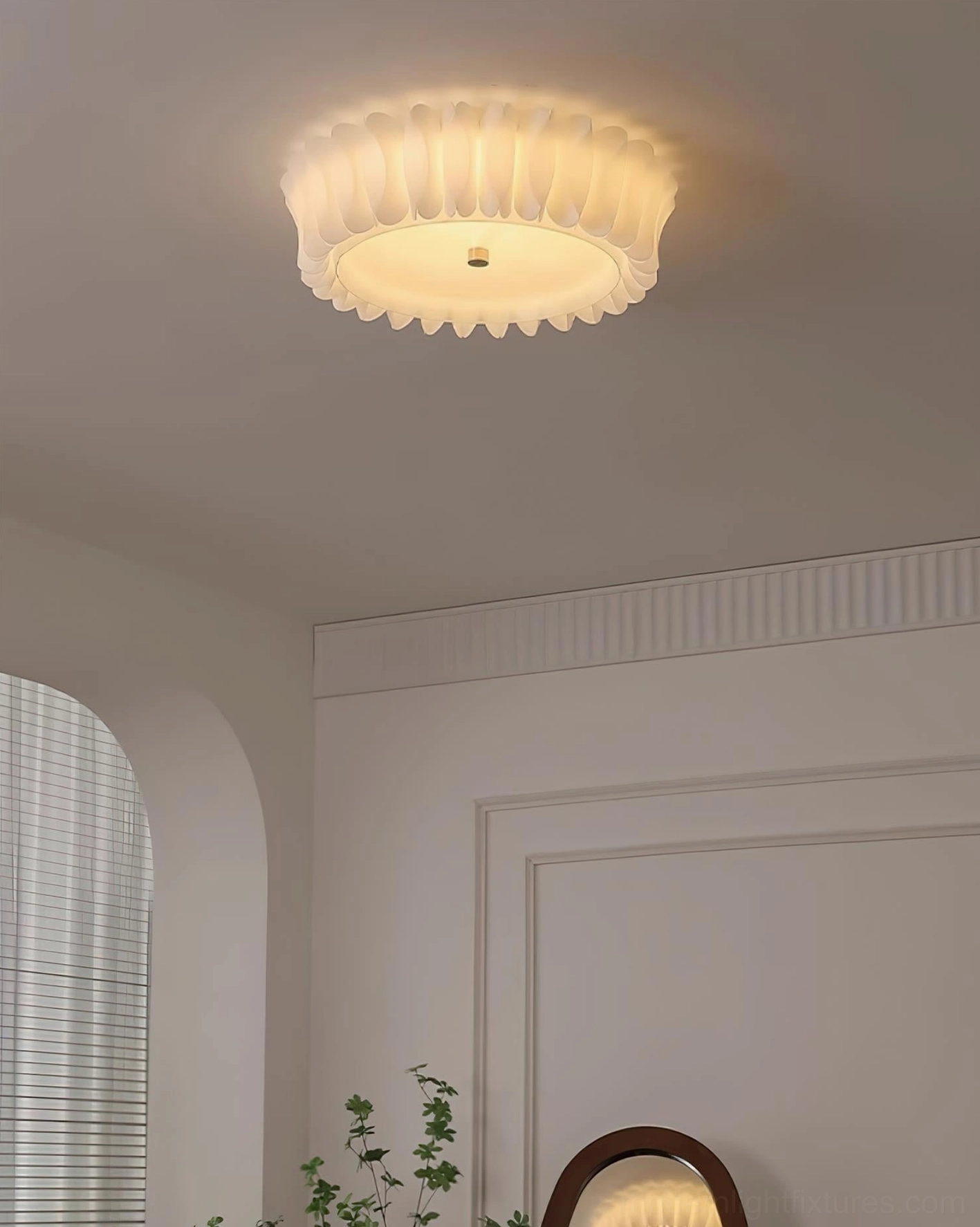 Figura ruffled ceiling light showcasing sculptural petal silhouette in minimalist home decor