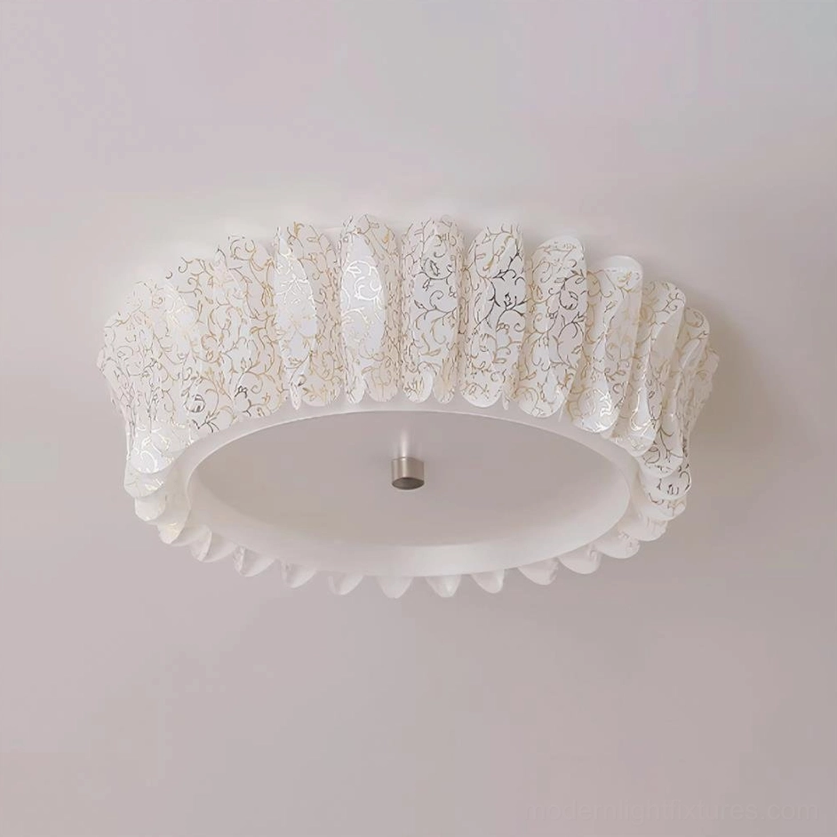 Figura ceiling light yellow color variant with ruffled petal design, integrated warm white LED