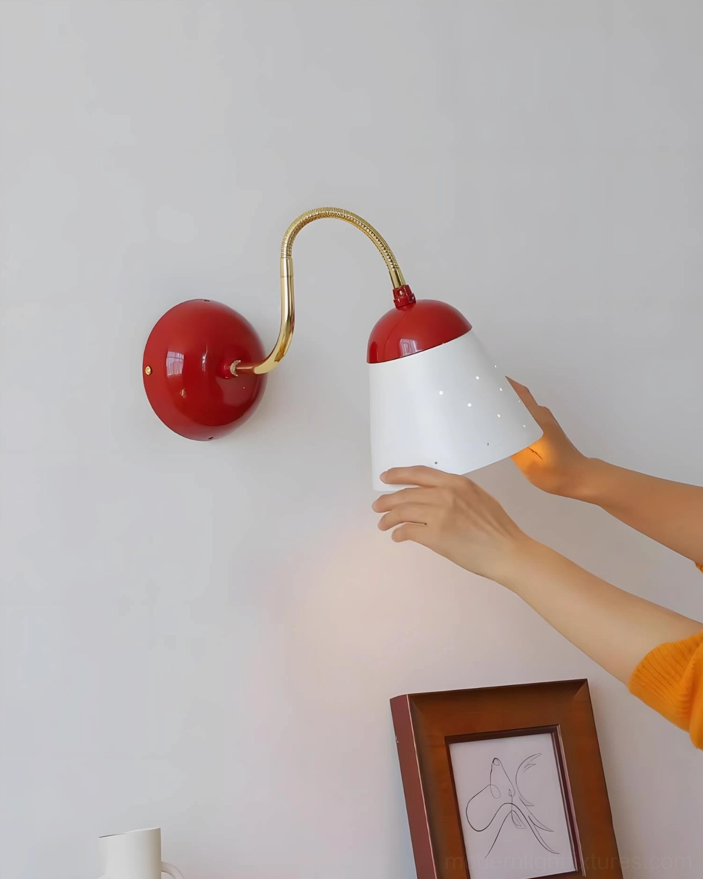 Filo contemporary wall lamp with dimmer compatible hardwired construction for customizable ambient lighting