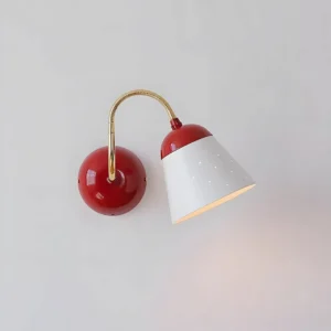 Filo gooseneck wall sconce with polished gold hardware and flexible curved arm, front three-quarter view against white wall