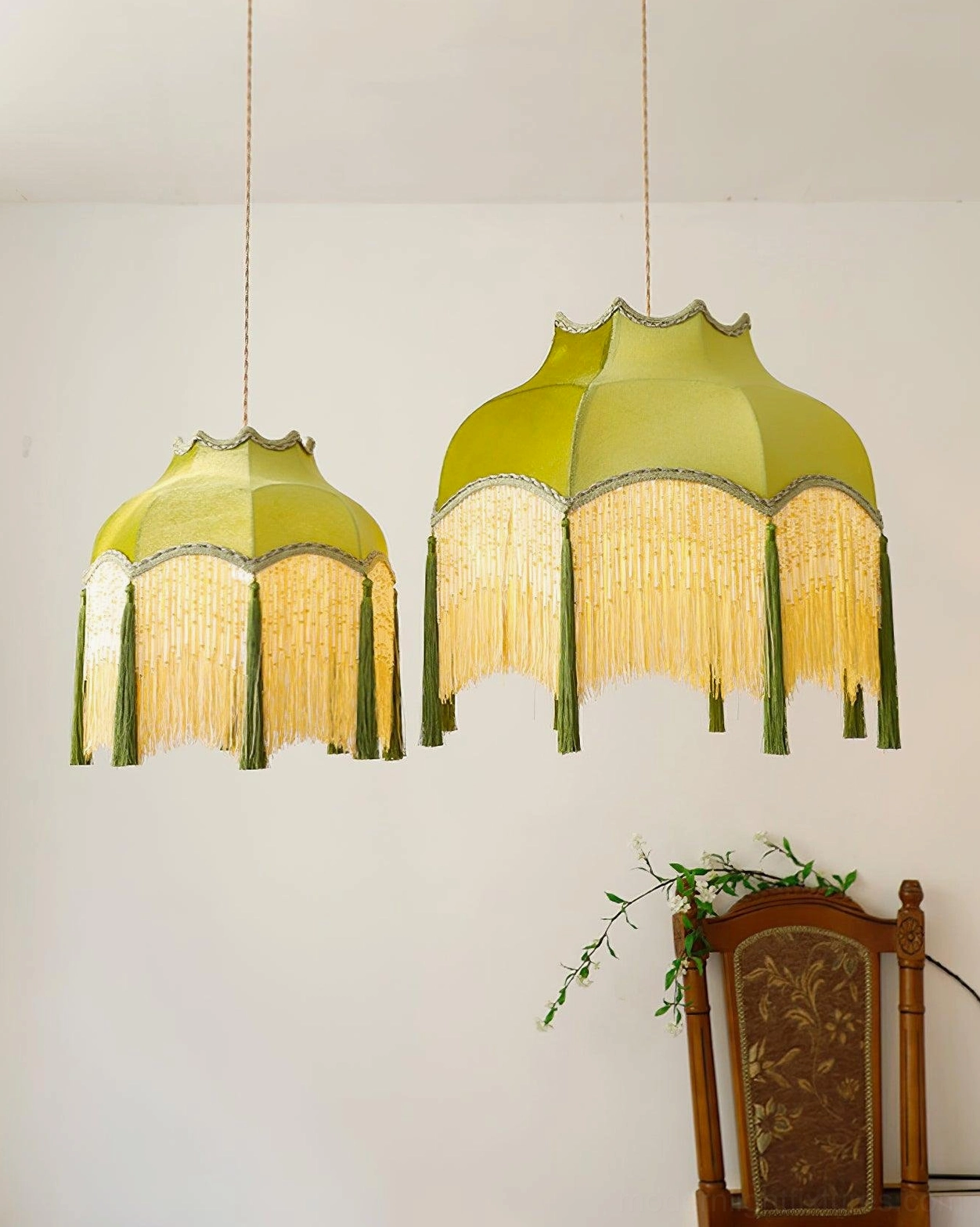 Fina tassel pendant light creating warm ambient lighting in entryway space