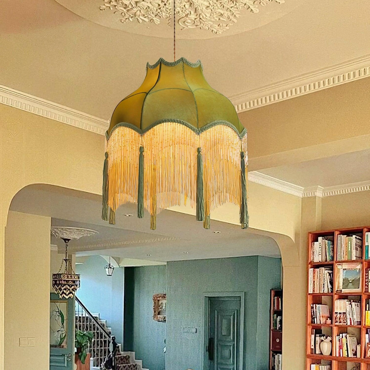 Fina tassel pendant light displayed in vintage home library with bookshelves