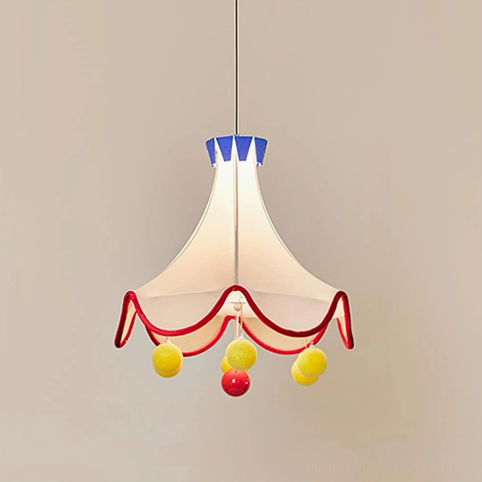 Finaflor circus tent pendant light front close-up studio shot beige fabric shade with fewer pom-pom pendants yellow and red decorative balls plain background