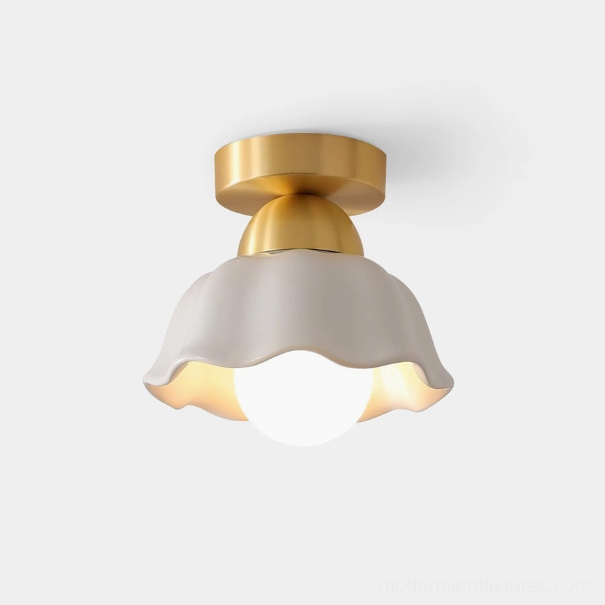 Finley brass and white ceramic flower ceiling light fixture front view, modern minimalist semi-flush mount with handcrafted ruffled shade