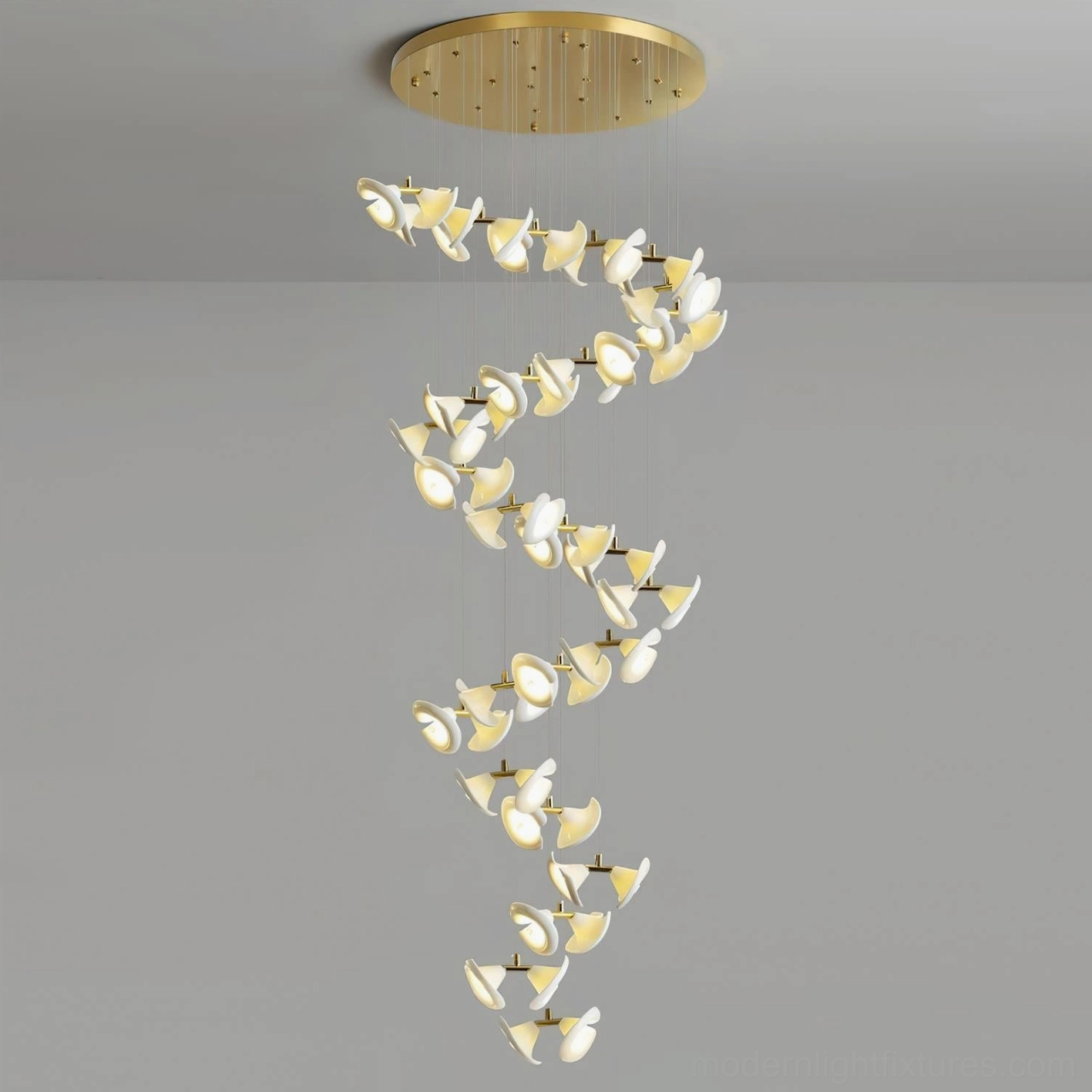 Fiora modern petal-disc chandelier illuminated evening soft diffused light ambiance