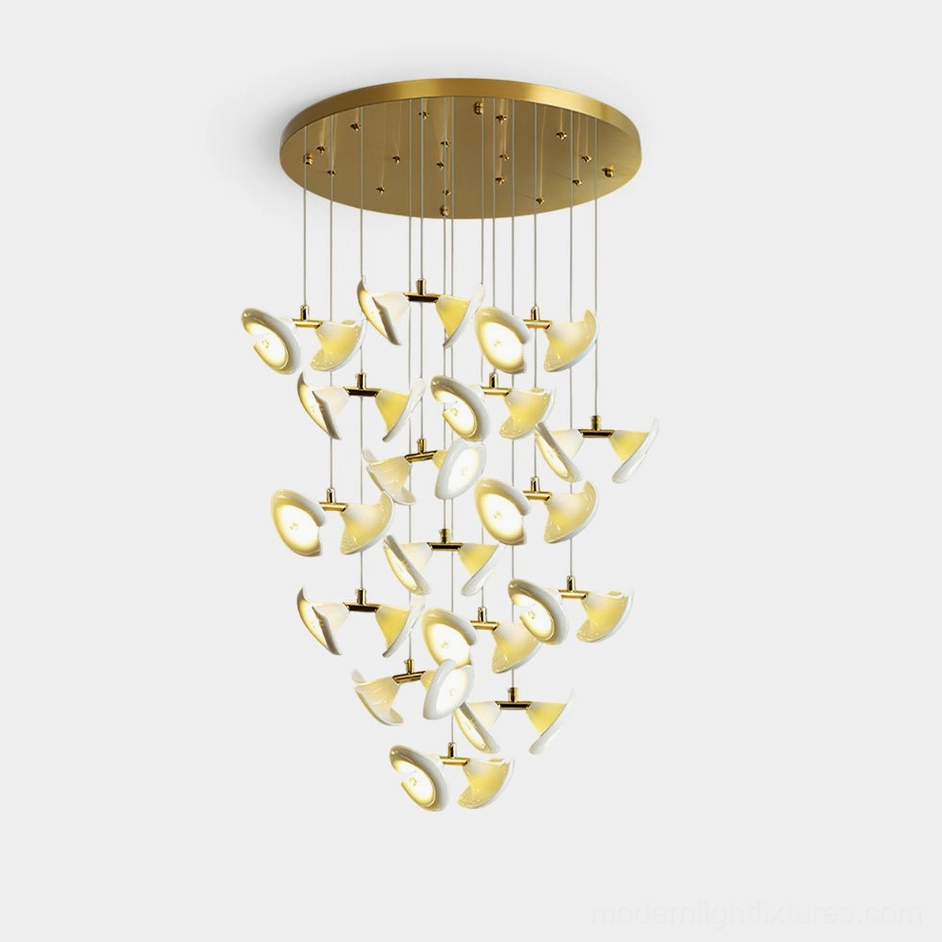 Fiora modern spiral cluster chandelier with petal-disc design in gold finish, front view studio shot