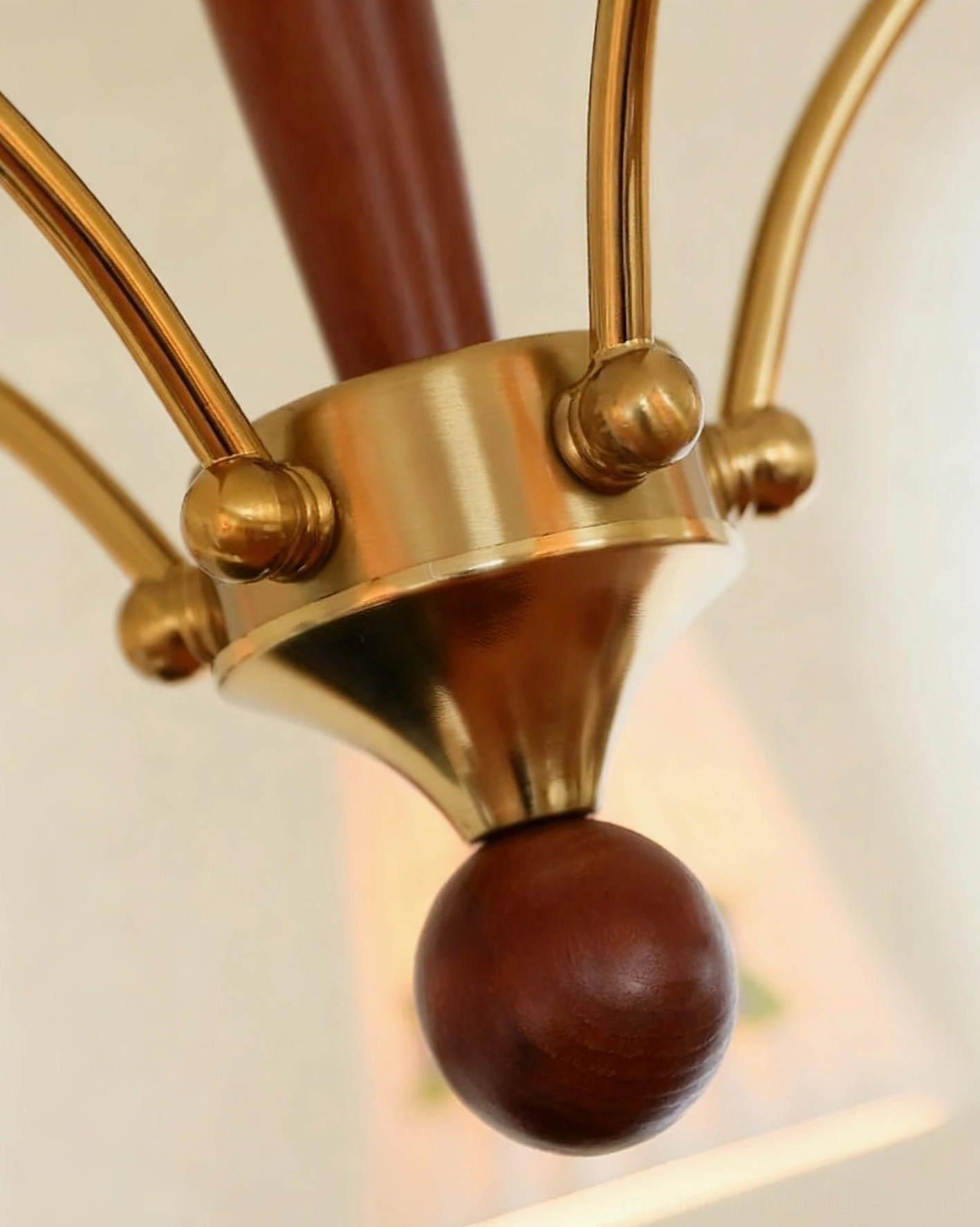 Full view of Fiorenta 5-light chandelier demonstrating brass arms, wood center post, and architectural balance