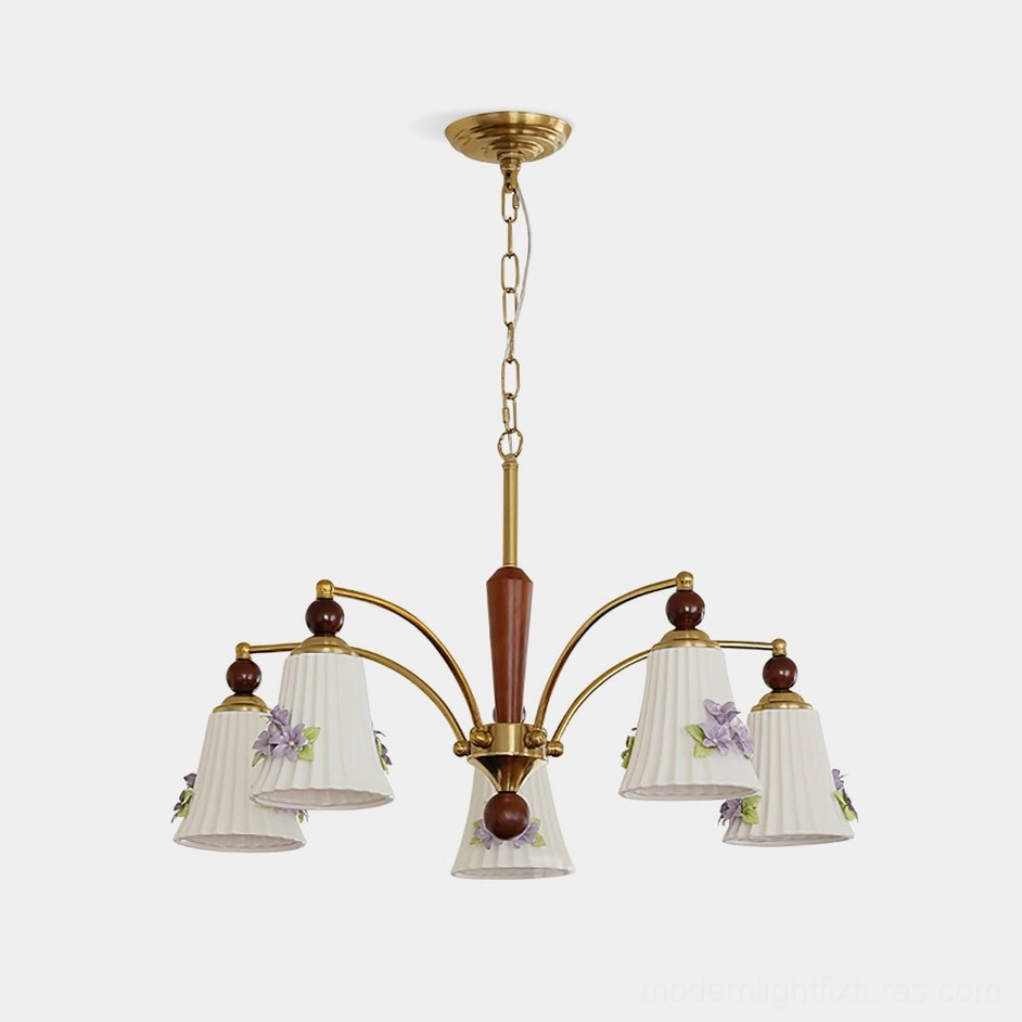 Fiorenta 5-light floral chandelier with brass arms and hand-painted ceramic shades in studio front view