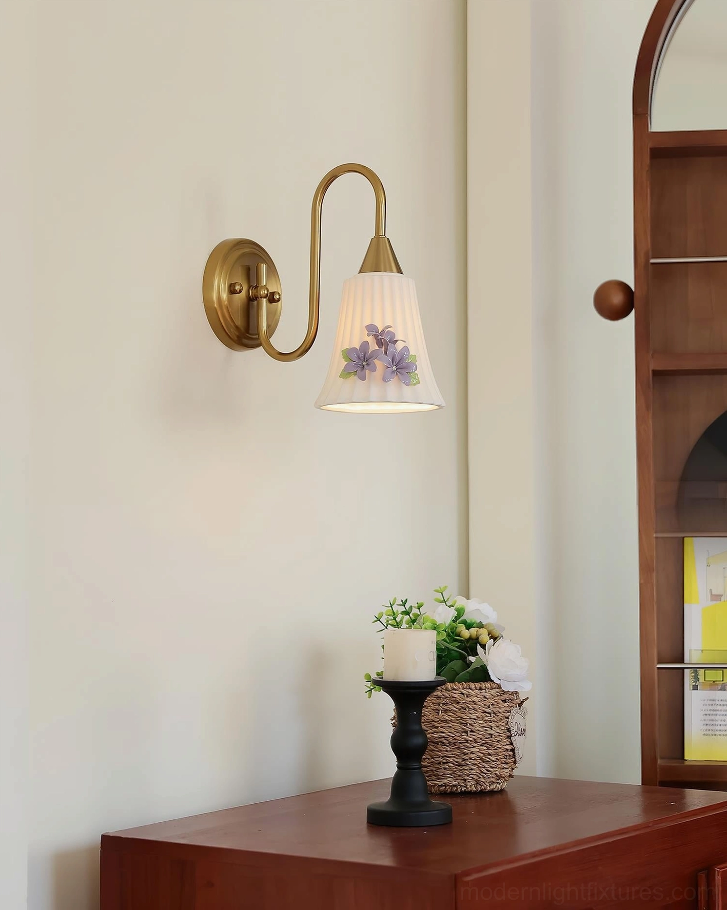 Fiorenta floral wall lamp left side view with purple flower ornament on pleated shade and brass hardware