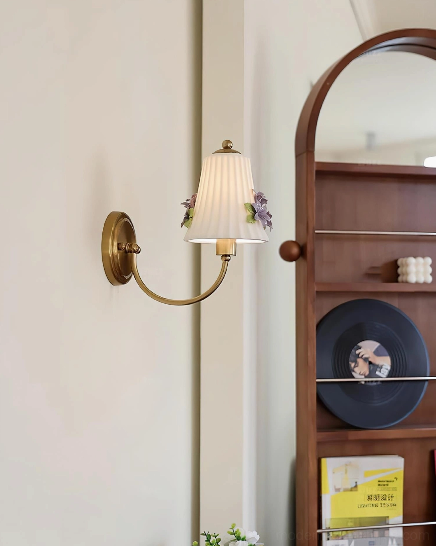 Fiorenta vintage wall sconce installed view demonstrating warm brass metal arm and romantic floral shade lighting