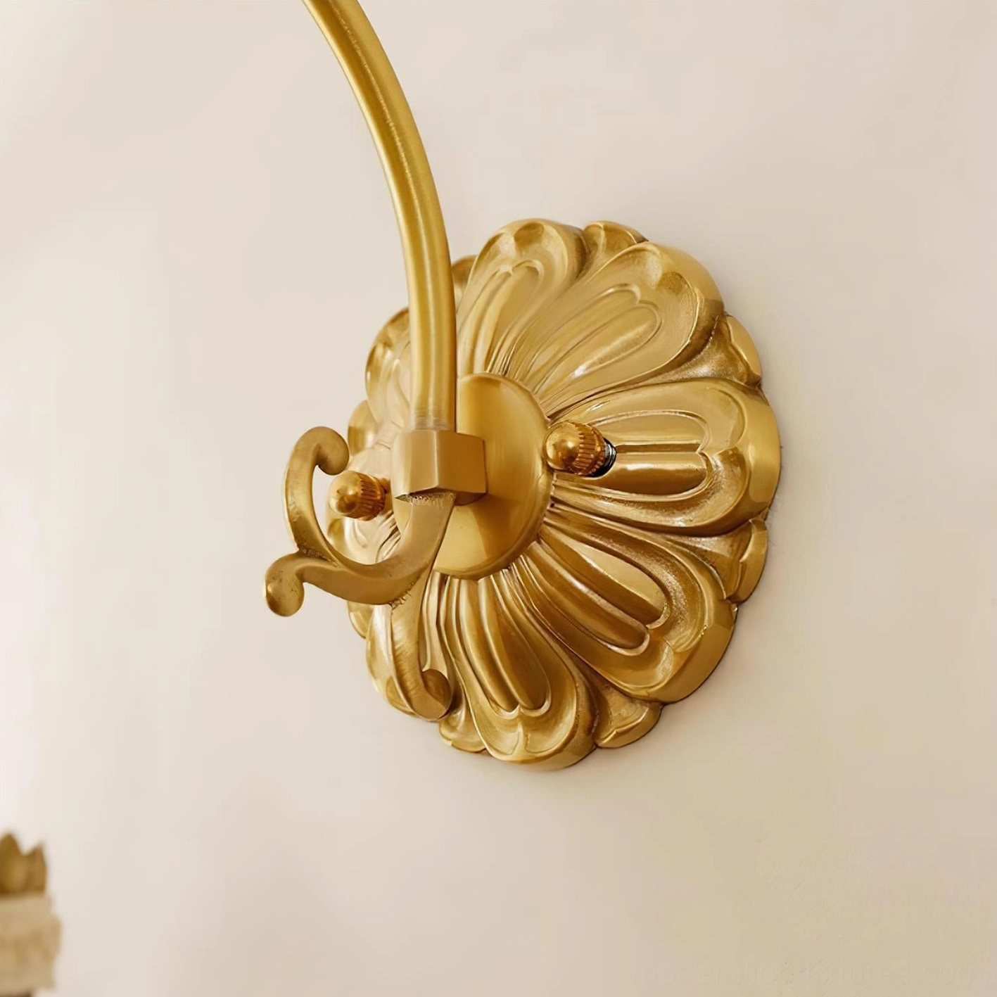 Vintage beaded wall lamp with hand-strung rose motif and brass curved arm detail photographed at angle