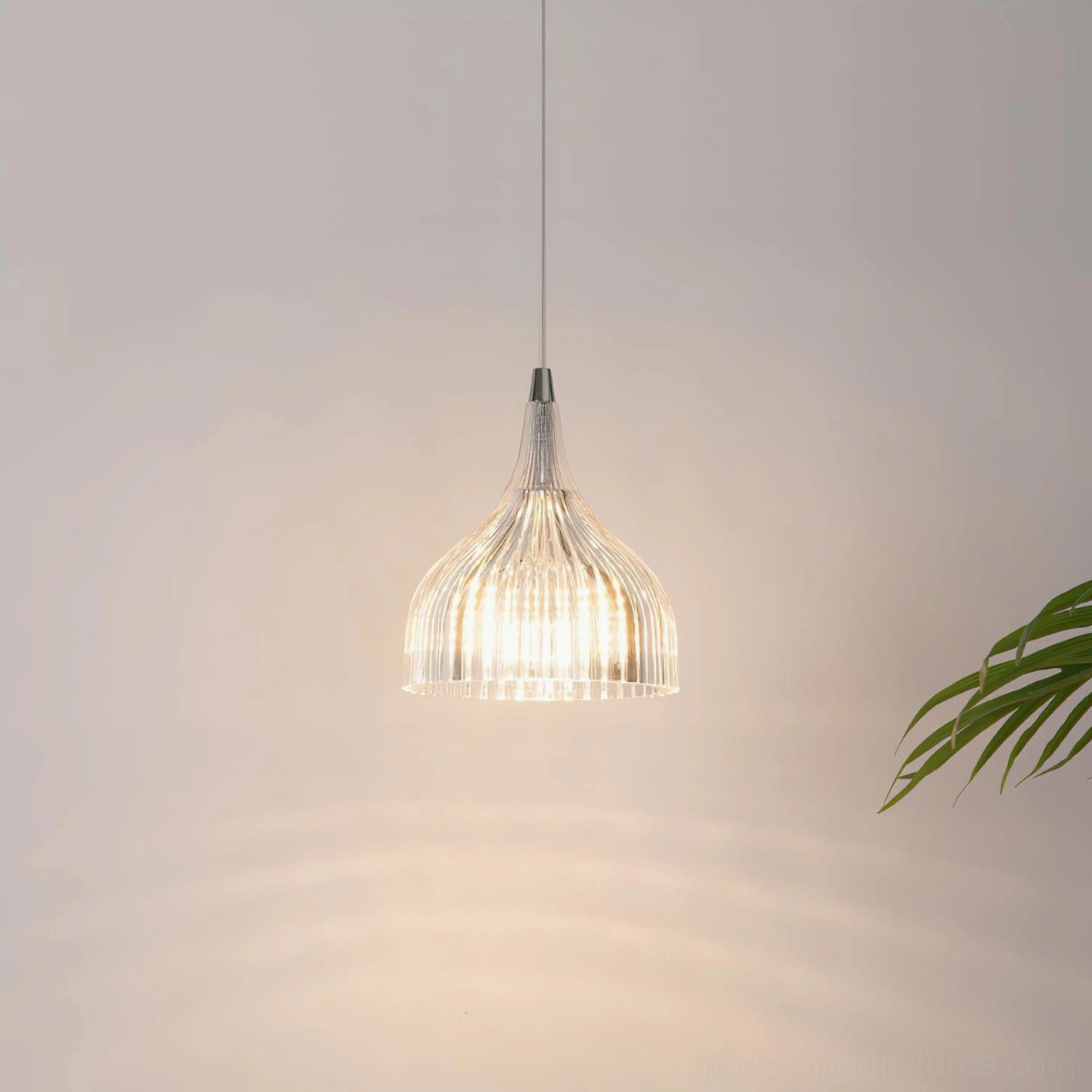 Multiple Flare pendant lights creating ambient lighting in contemporary dining space with modern furniture and neutral palette