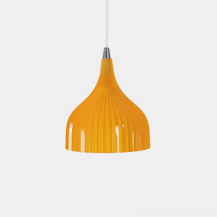 Flare ribbed pendant light with amber glass shade in studio setting, showcasing detailed vertical fluting and sculptural form