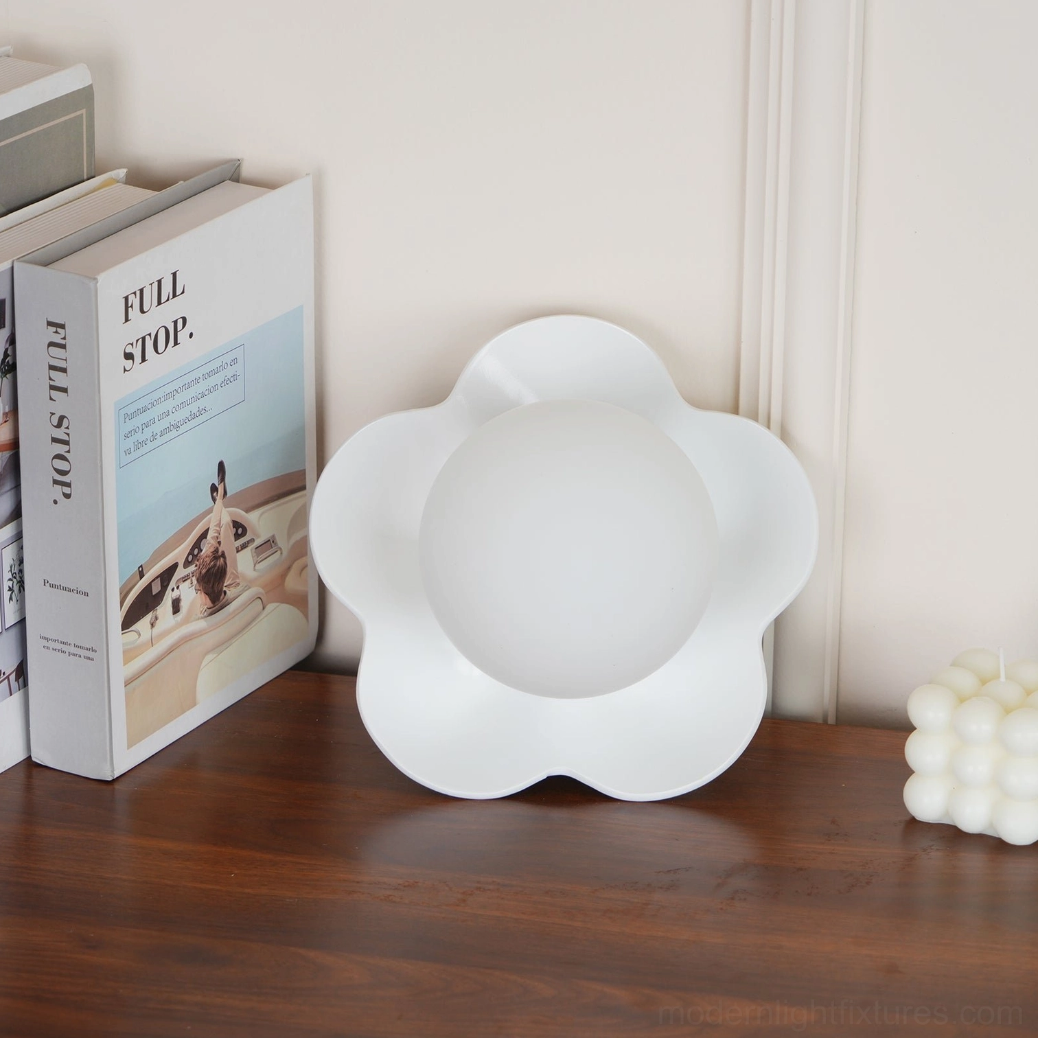 Fleur wall lamp detail close-up - hand-finished resin petals and frosted glass diffuser craftsmanship