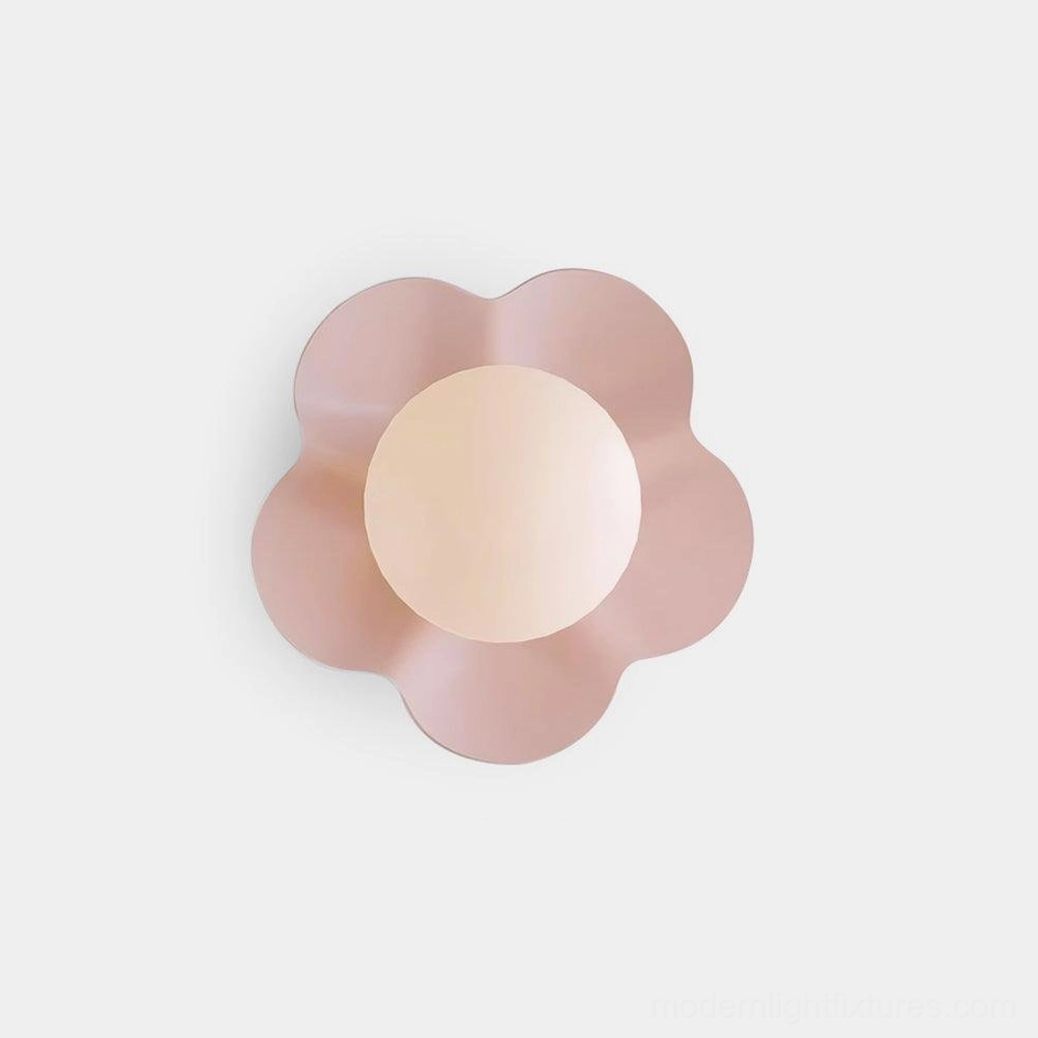 Fleur sculptural wall sconce detail shot showing resin petal craftsmanship and frosted glass diffuser construction