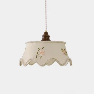 Fleurina scalloped fabric pendant light with embroidered pink blossoms and pearl-bead trim, front studio view on white background
