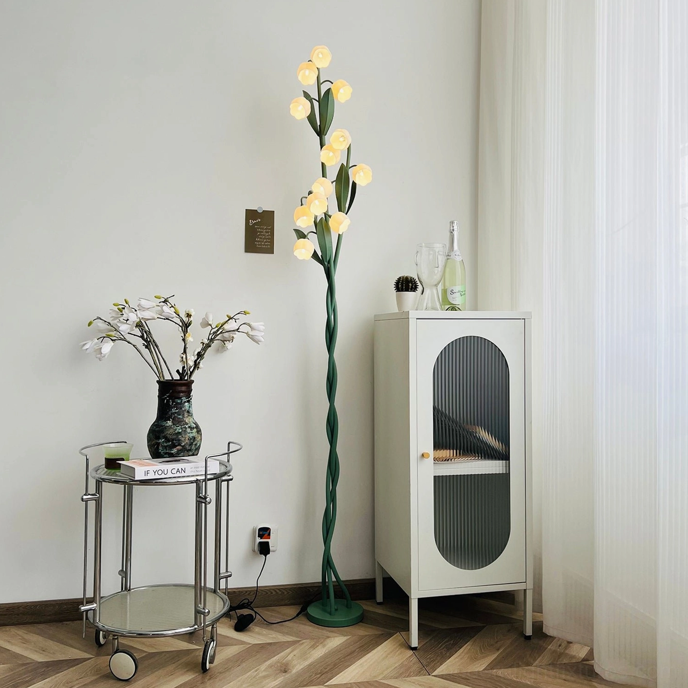 Lily of the valley floor lamp detail shot showing white frosted acrylic flower shades and metal construction quality