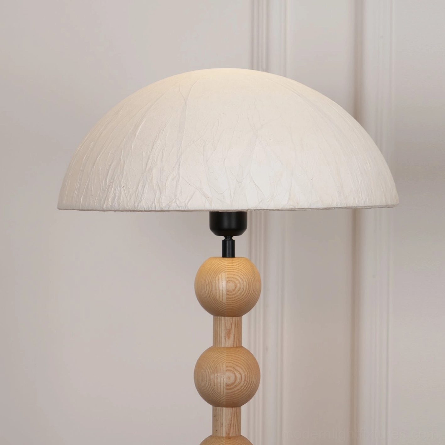 Floor lamp beaded wood pole base stability sturdy design element
