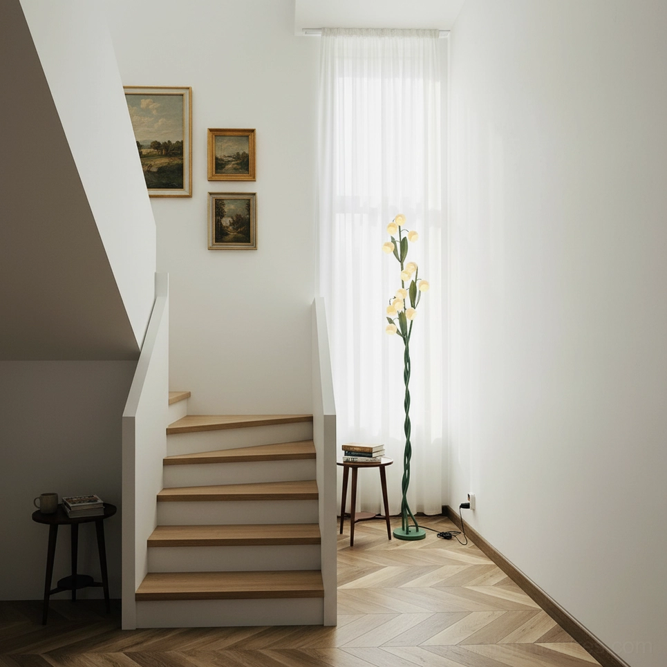 Modern green floor lamp with sculptural stems and white flower-shaped lampshades, side profile view