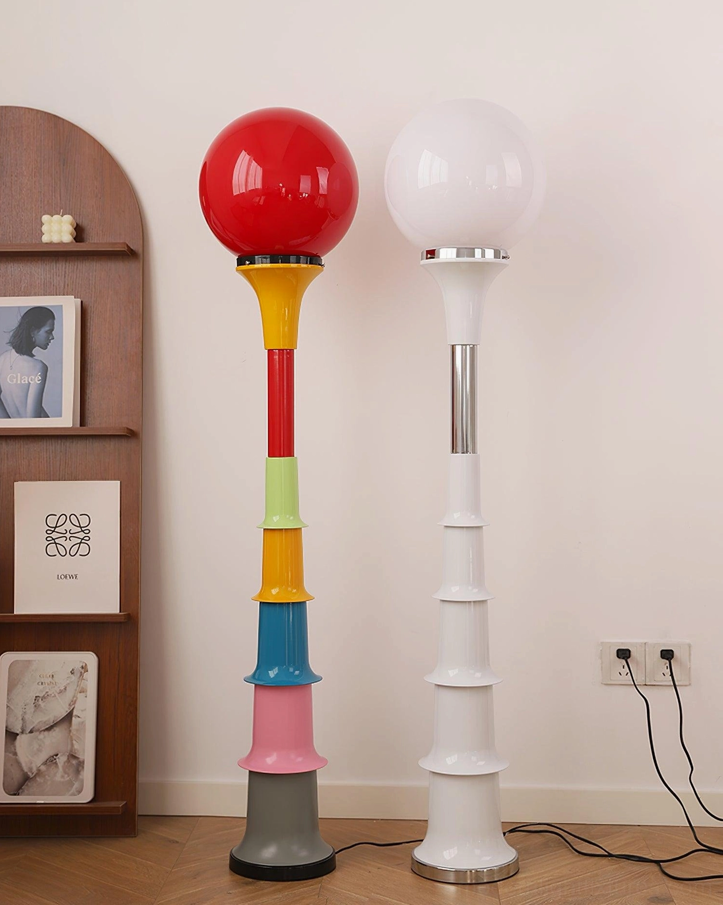 Two contemporary floor lamp color variants - pastel color-block and all-white models displayed together