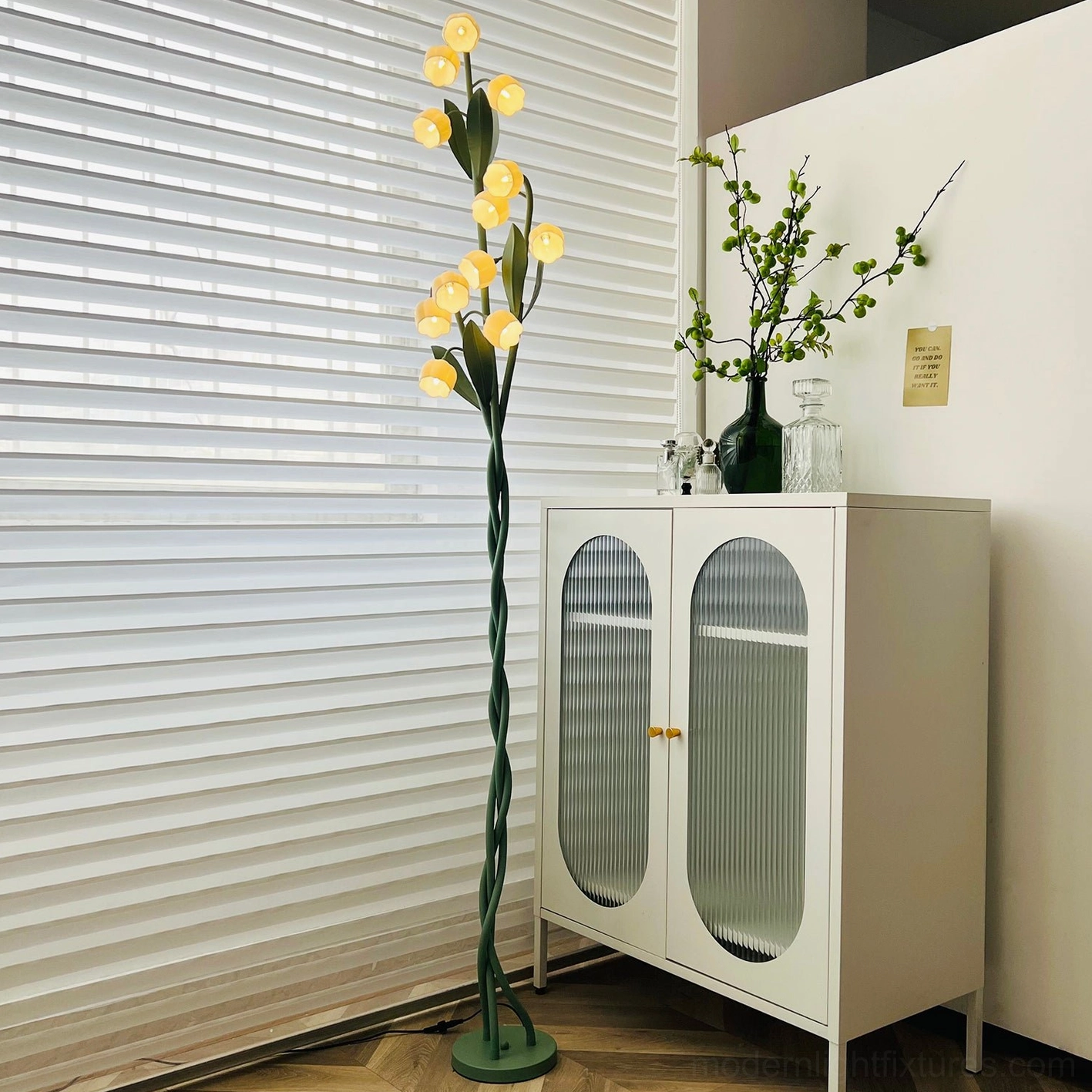 Modern botanical floor lamp detail showing foot switch control and energy-efficient LED-compatible socket