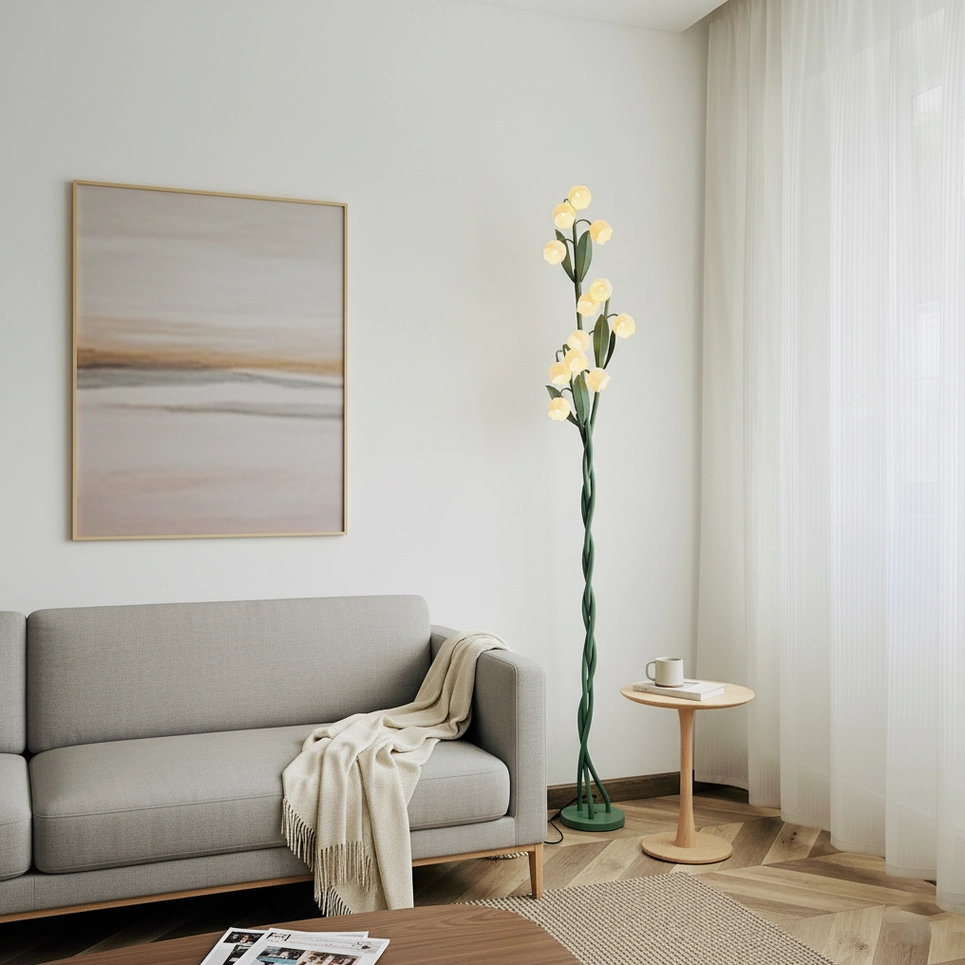 Lily of the valley floor lamp in minimalist Nordic living room with gray sofa, warm lighting, and sheer curtains