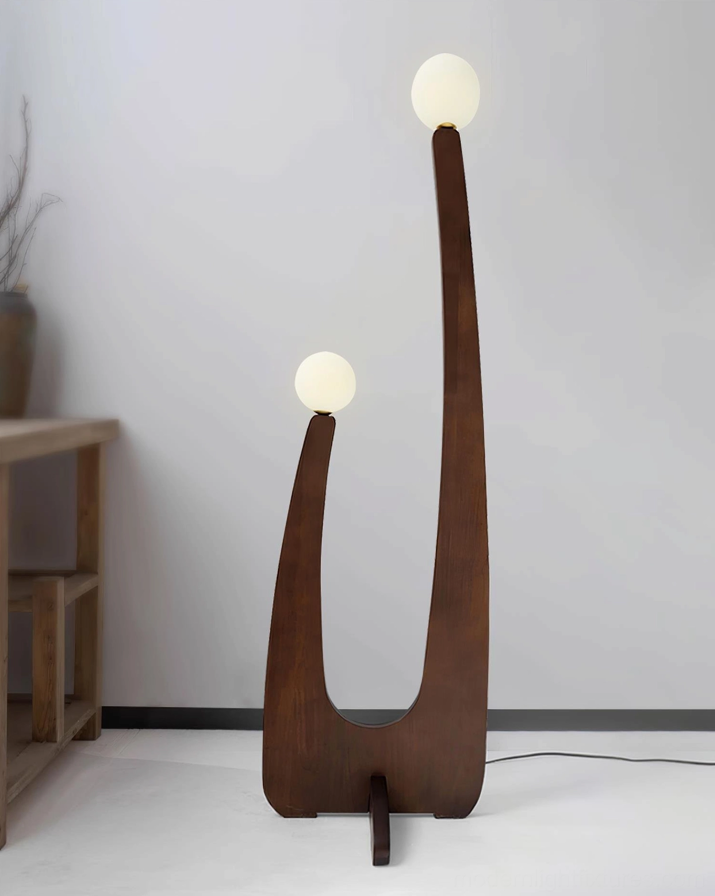 Solid oak floor lamp with frosted glass shades, side profile showing turned wood base and warm wood grain