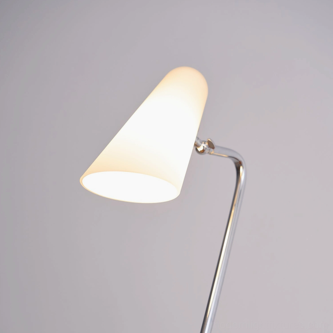 Contemporary floor lamp with adjustable opal glass shade creating warm inviting glow in modern farmhouse decor