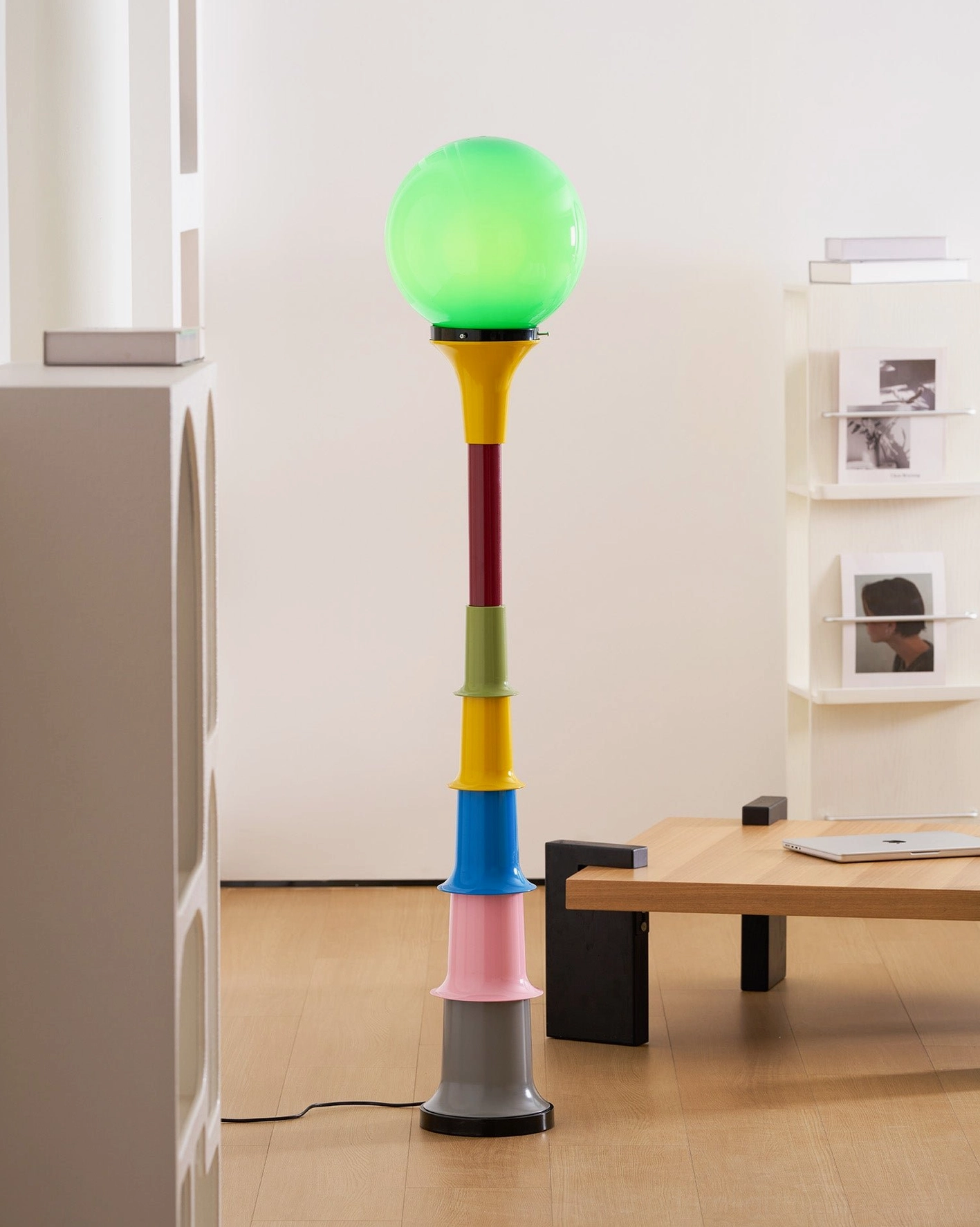 Segmented floor lamp detail showing color-block segments and metal construction quality