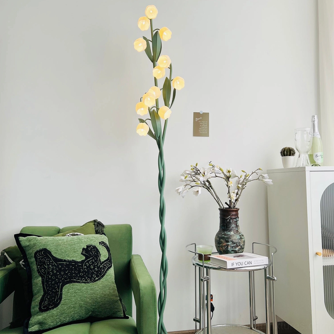 Botanical floor lamp with USB charging port at base, showcasing modern functional features for contemporary living