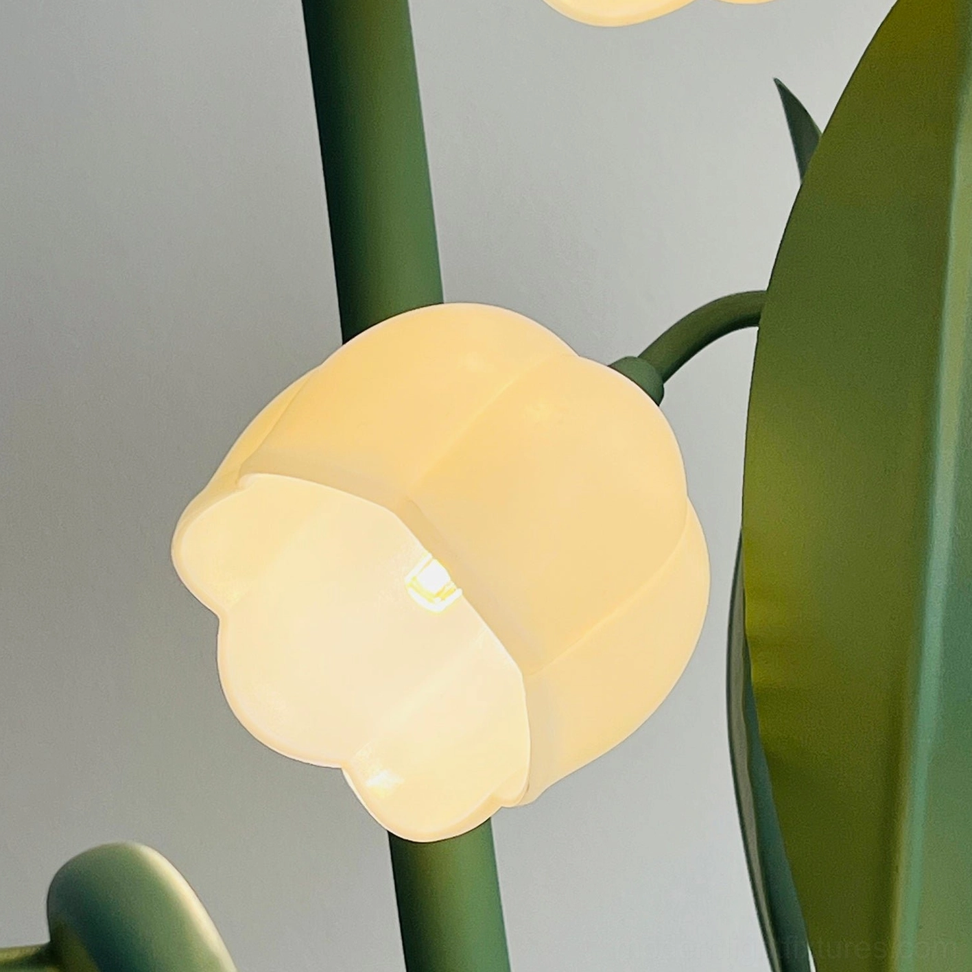 Three-bloom floor lamp creating warm welcoming atmosphere in contemporary home interior with acrylic flower shades