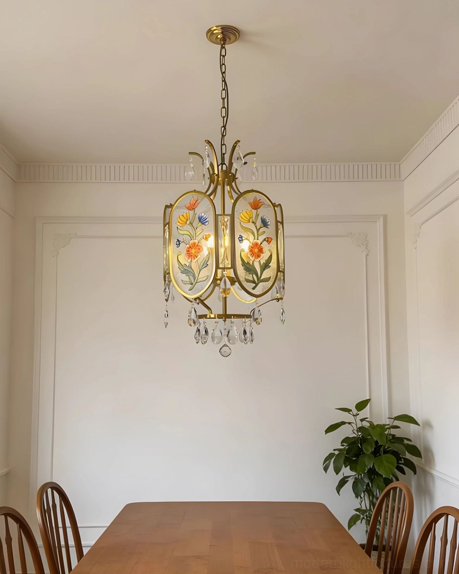 Floral pendant chandelier with multicolor enamel glass panels and warm brass finish in elegant transitional interior