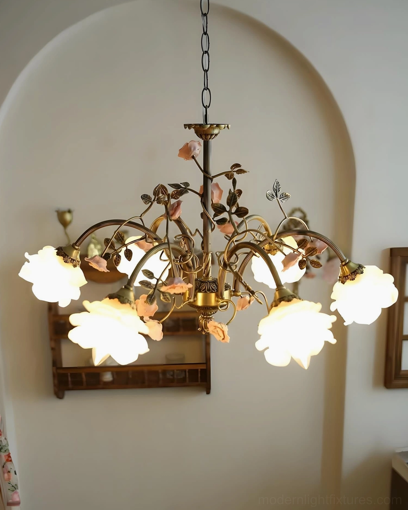 Romantic blush pink floral chandelier casting warm tender glow highlighting dreamy silhouette and feminine refinement in elegant interior