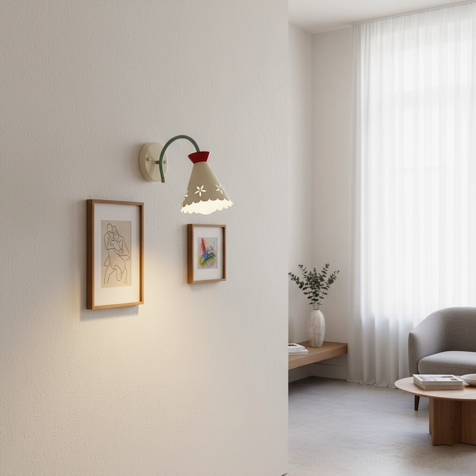Pastel wall sconce with floral cutout shade detail - close-up view