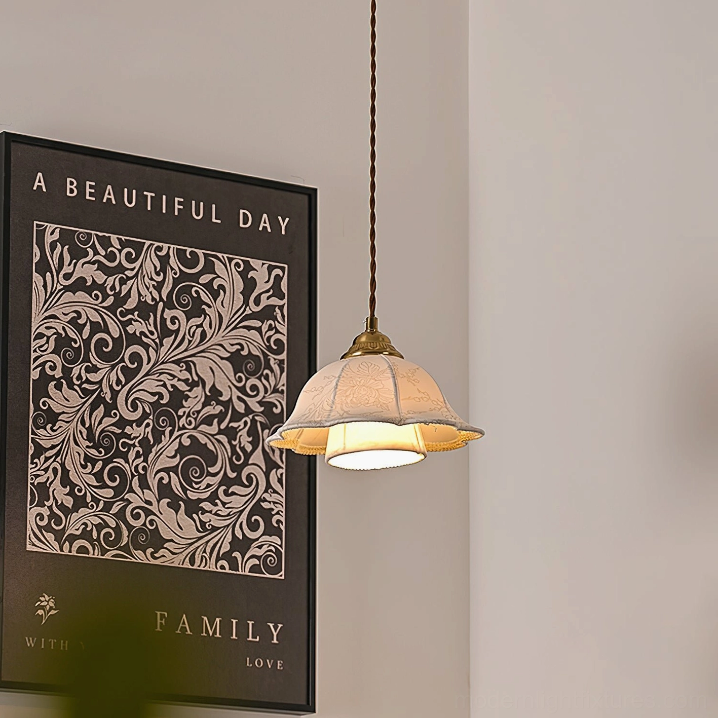 Floral embossed fabric pendant light mounted on hallway wall with decorative artwork backdrop