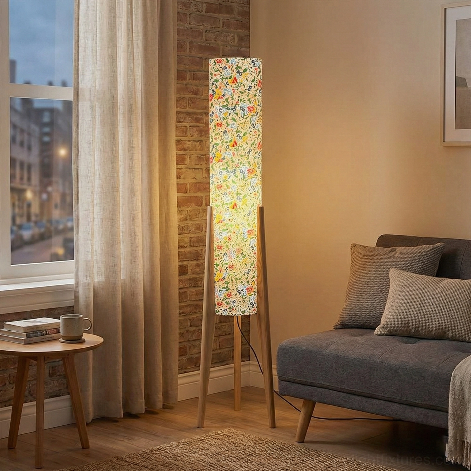 Floral floor lamp with wooden tripod base design detail and fabric shade construction close-up view
