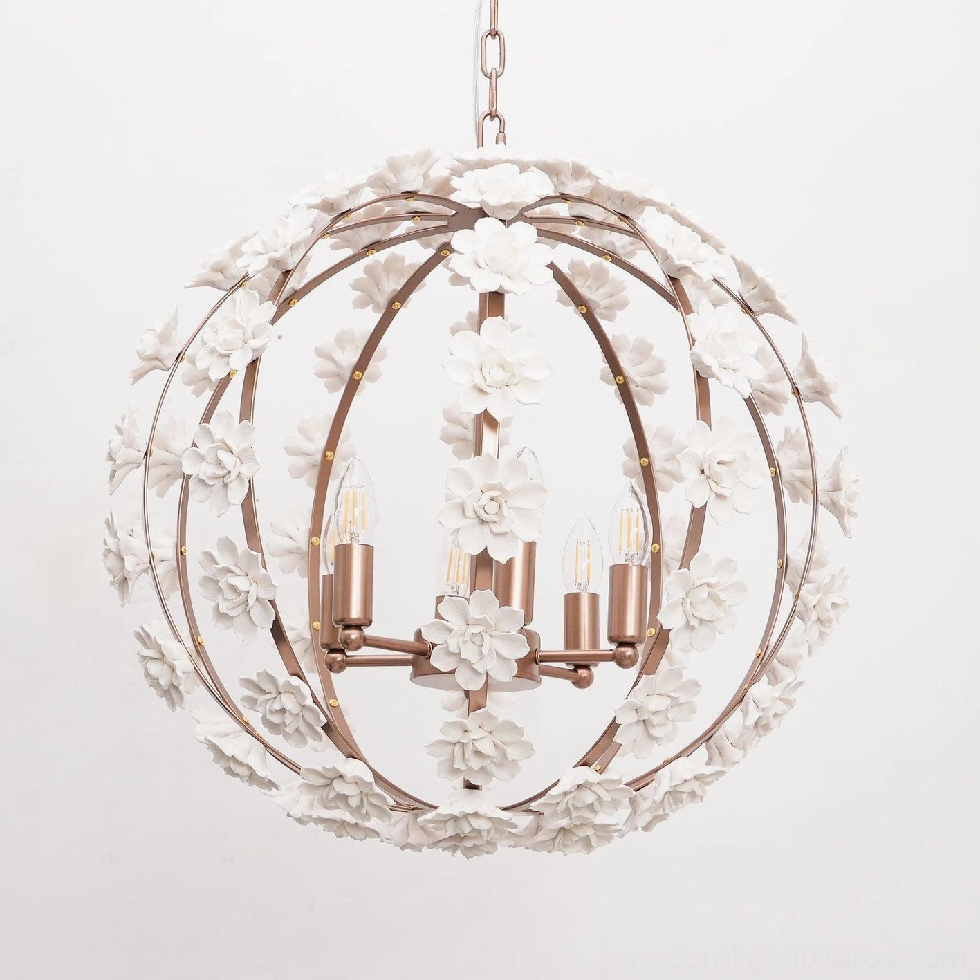Botanical ceramic flower globe pendant with full white floral coverage, side angle view