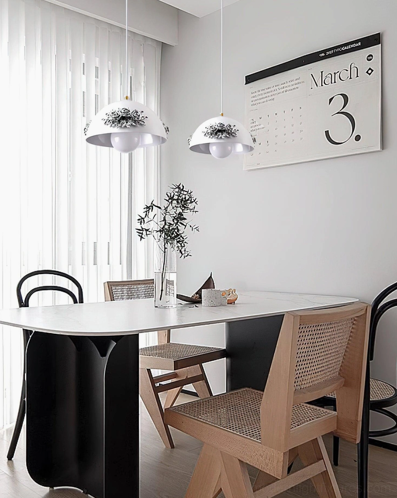 Floral pendant light fixture installation in modern home setting, warm ambient lighting with rose appliqué dome design