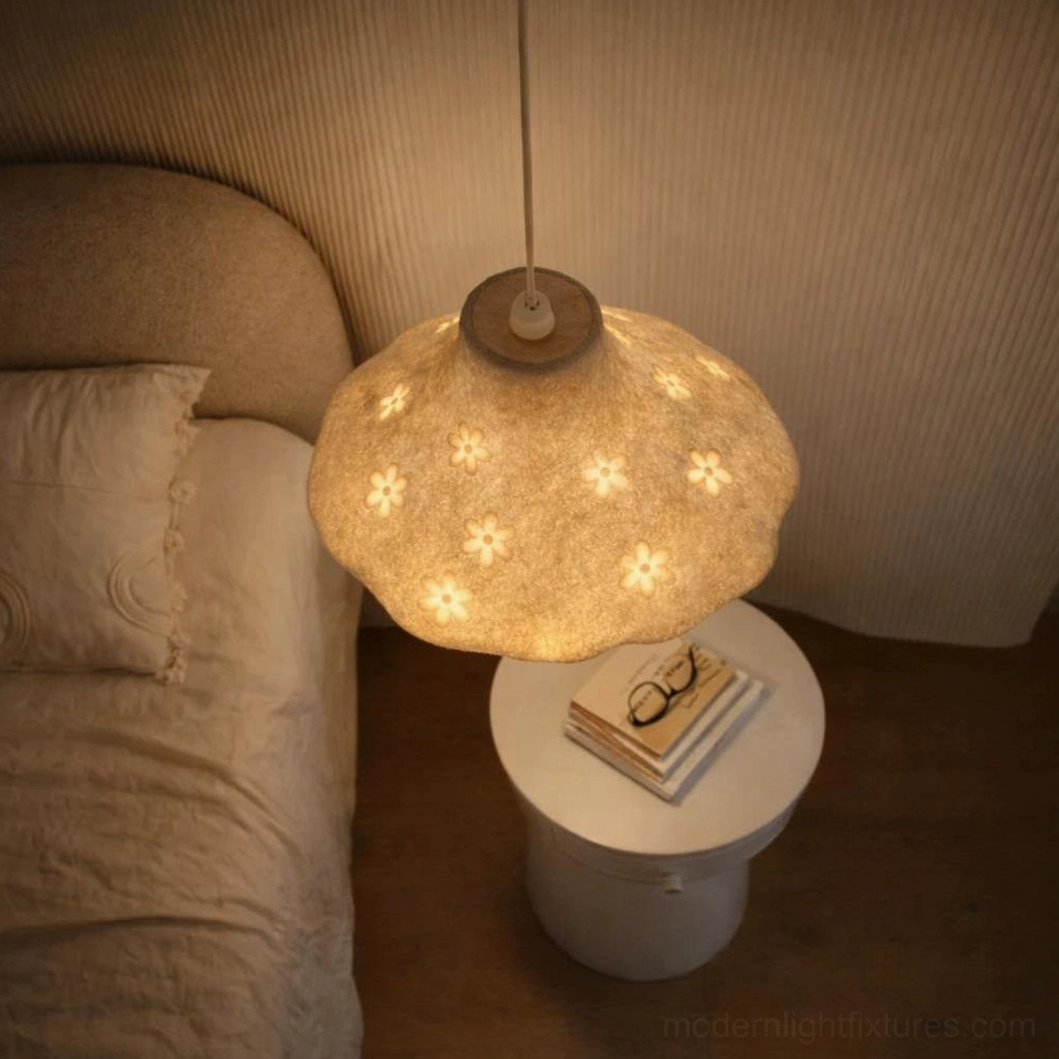 Soft botanical pendant light above bedroom bedside table creating cozy intimate ambiance, warm glow perfect for relaxation and reading