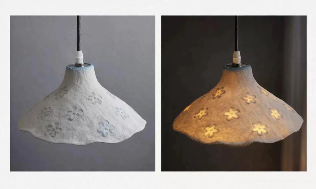 Dual-tone floral pendant lamp comparison showing off-white and beige color variants with intricate flower motif cutouts, studio product display