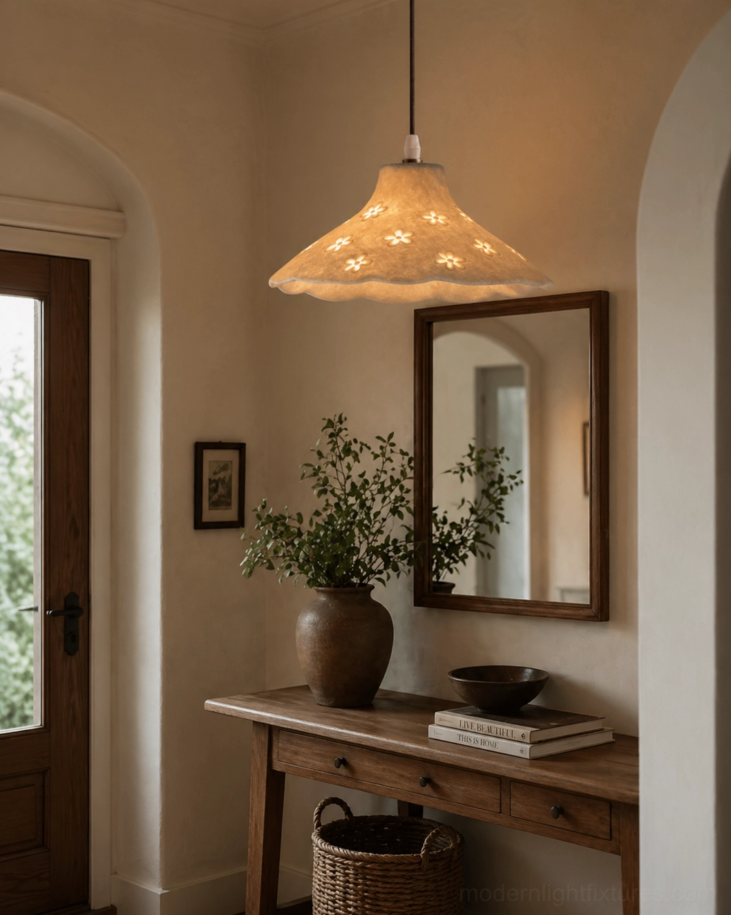 Floral pendant fixture in neutral rustic entryway with console table and wall mirror, artistic statement lighting for welcoming foyer space