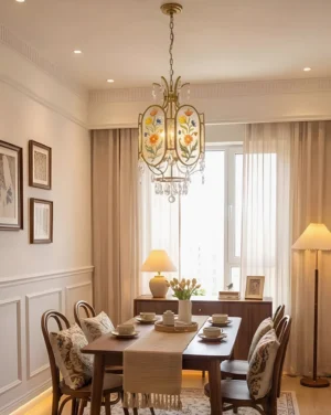 Jardinelle floral pendant light installed in formal French country dining room above wooden dining table with elegant table setting