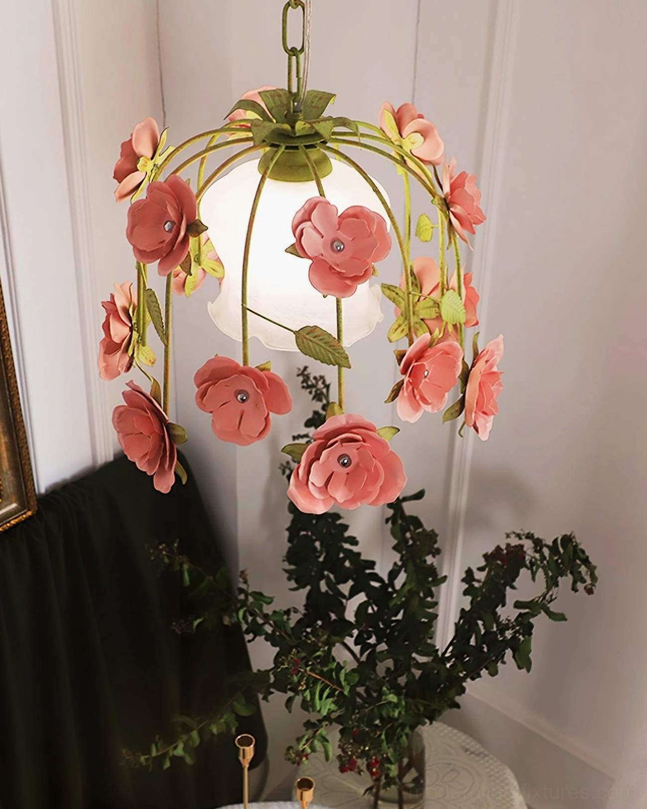 Hand-carved floral pendant light with pink and yellow flowers, white frosted shade, warm pastoral romantic style with green plants